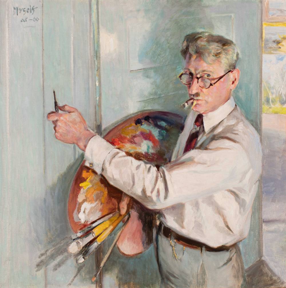 Gray-haired man wearing a white shirt and gray pants.  He is holding a palette and paintbrushes.